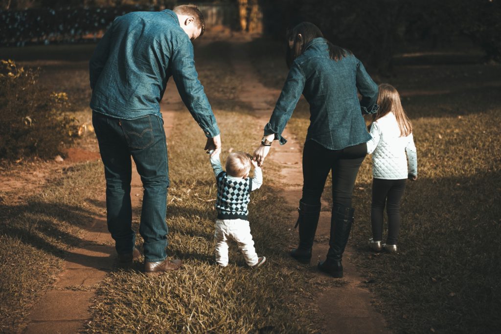 family-walking-on-path
