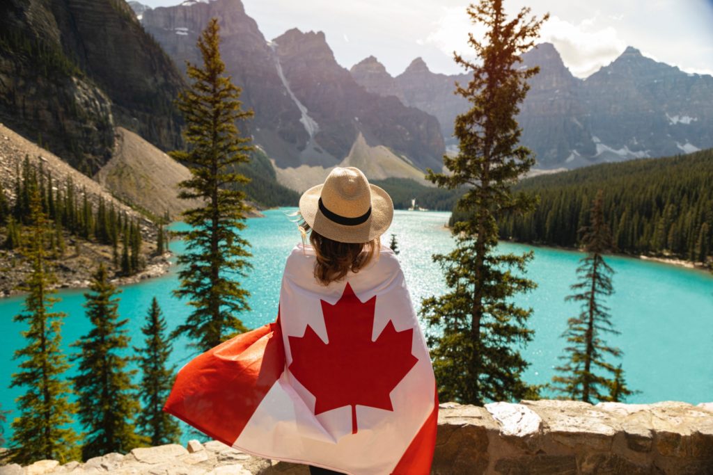 woman-draped-in-a-flag-of-canada